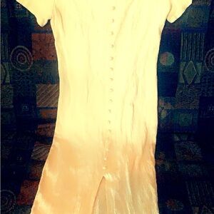 Lovely cream colored dress. Long with sexy slit in the front